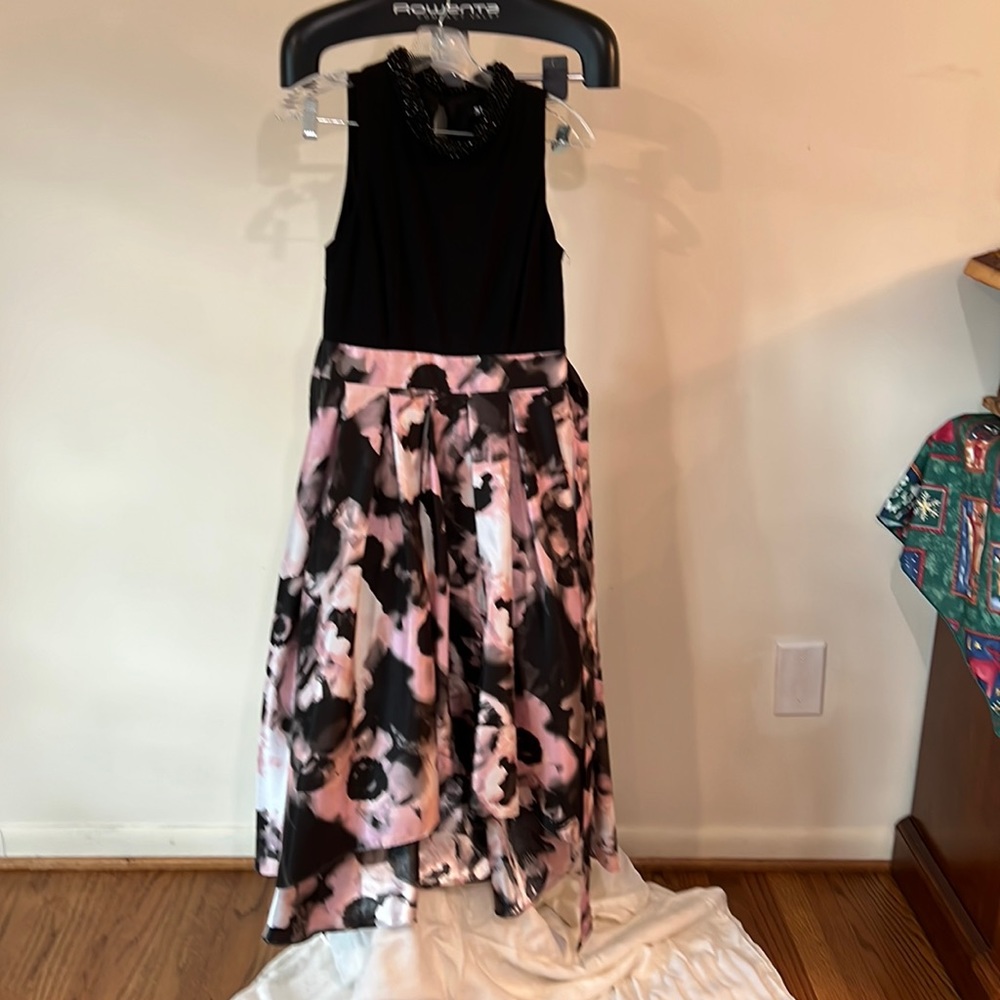 Dress worn to a wedding worn once.Hi Low above knees in the front, extra ruffle